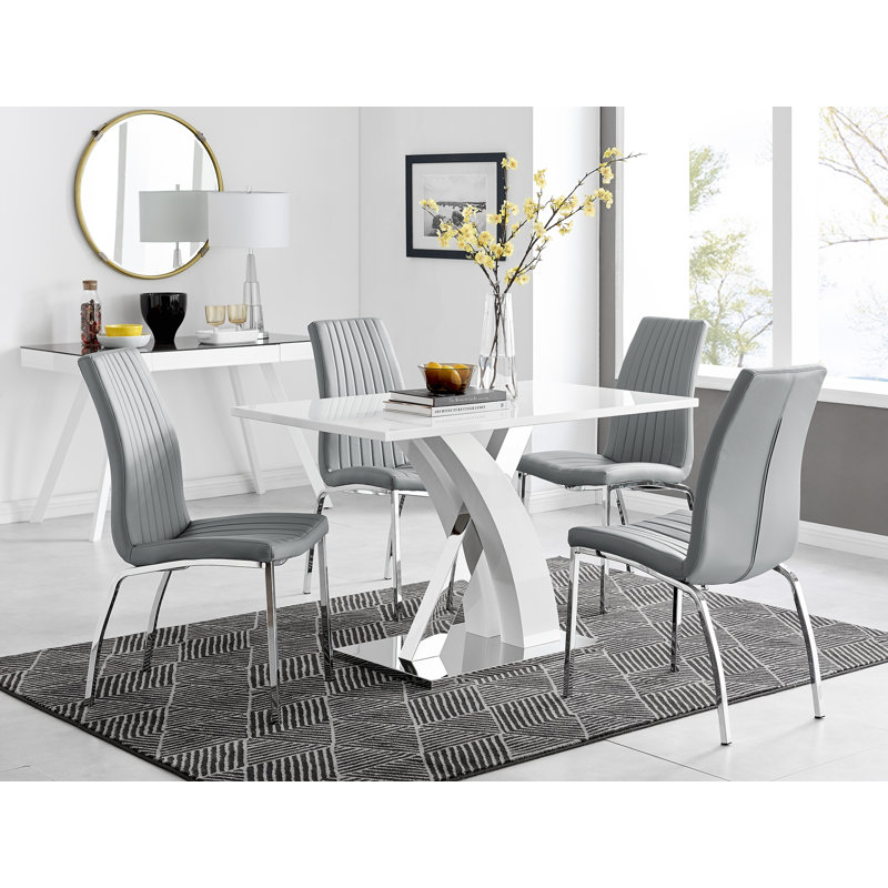 Ensemble de table de salle à manger Edzard en chrome et blanc ultrabrillant avec 4 chaises de salle à manger en similicuir de luxe