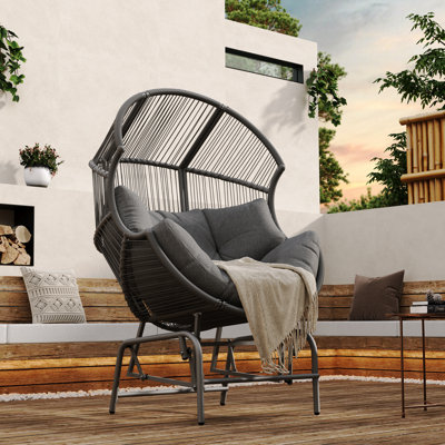 Fauteuil oscillant d'extérieur en osier gris foncé Palos