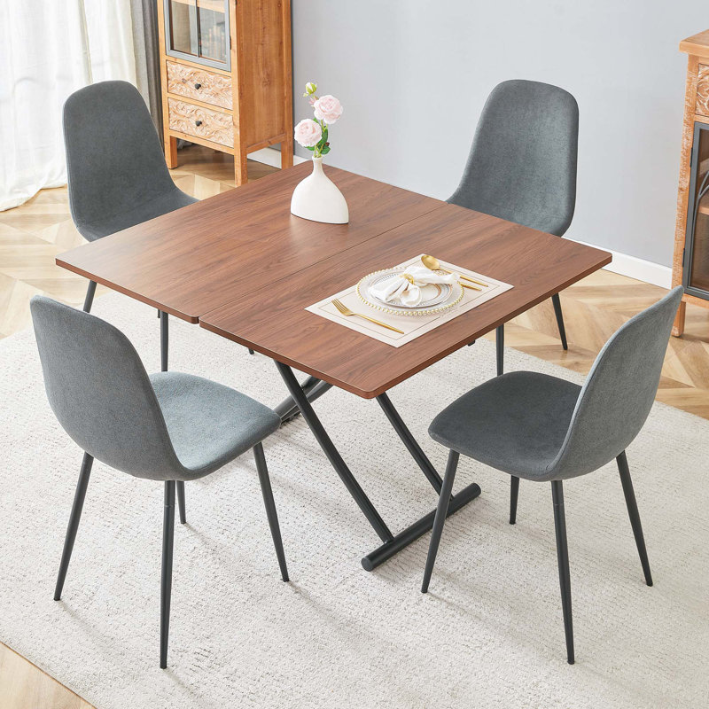 Ensemble de table et de chaises. Plateforme de levage multifonctionnelle moderne, plateau en panneau de fibres à densité moyenne en bois de noyer, pieds en métal, assorti à 4 chaises en tissu de lin.