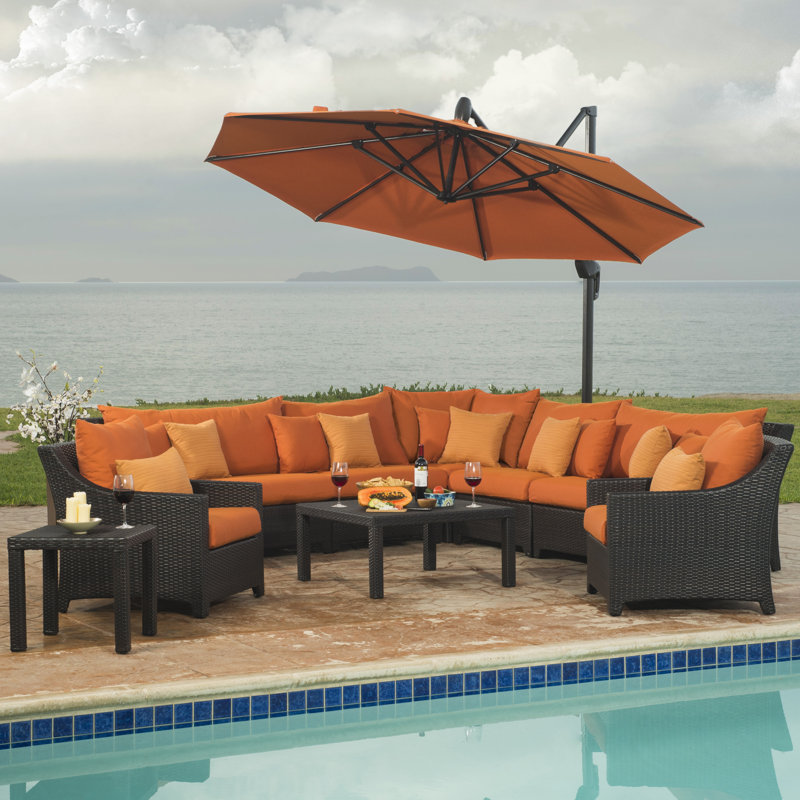 Fionnula 10 Piece Rattan Sectional Seating Group With Sunbrella Cushion Covers, Spectrum Cayenne Sunbrella® Plainweave
