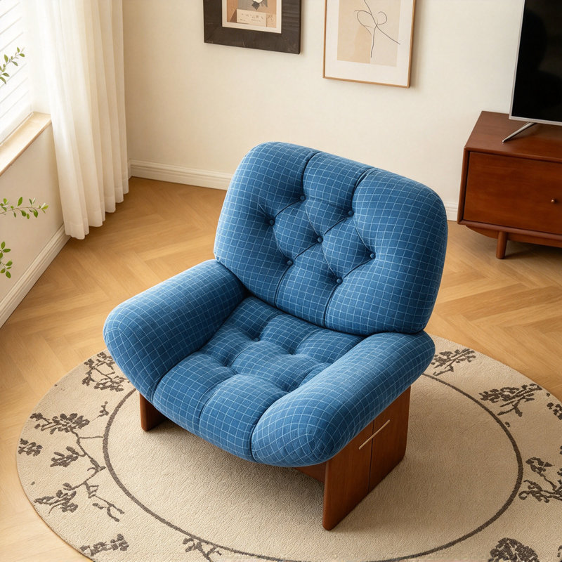Fauteuil lounge bleu au design moderne et épuré