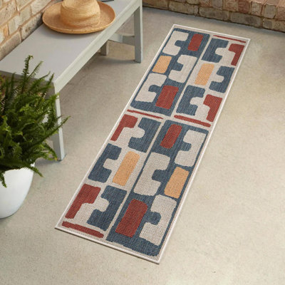 Tapis intérieur / extérieur en polypropylène tissé à la machine Dreson de couleur turquoise / beige / orange