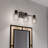 3-Light Matte Black Vanity Light with Clear Ribbed Glass Shades