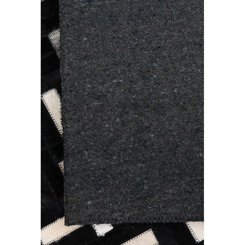 Tapis noir Nivens