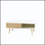 Table basse en rotin tissé avec rangement coulissant et pieds robustes en bois massif, parfait pour les intérieurs modernes et rustiques