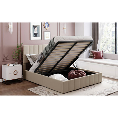 Grand lit avec revêtement beige et rangement hydraulique robuste pour une expérience relaxante