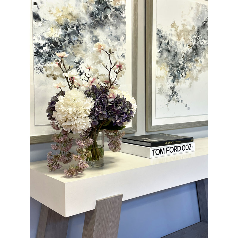 Hydrangea, Laurel and Magnolia Arrangement in a Glass Vase