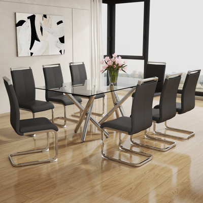 Daarina Modern Dining Table Set, Large Rectangular Glass Table with Silver X-Base and Faux Leather Cantilever Chairs