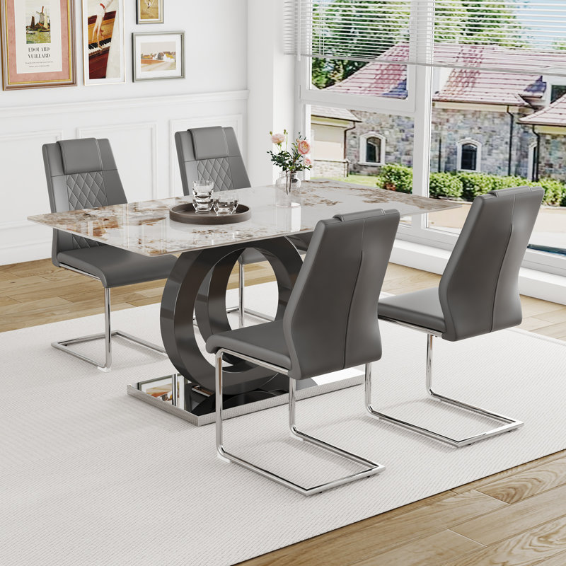 Ensemble de salle à manger: table en pierre frittée en marbre de 63 po x 31,5 po avec support en MDF en forme de O, jumelée à 4 chaises en polyuréthane gris foncé et pieds en métal argenté, parfaite pour les cuisines et les salles à manger