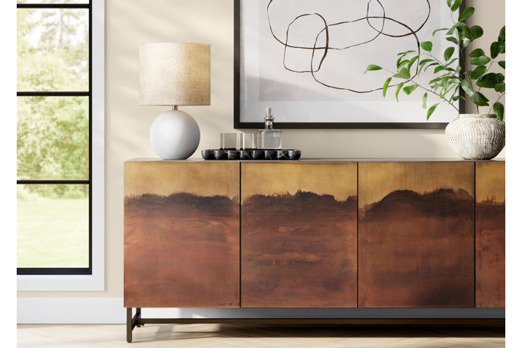 beige entryway with beige lamp and vase on brown console table