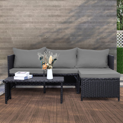Othoson 4 - Person Outdoor Wicker Patio Conversation Furniture Set with Table and Cushion
