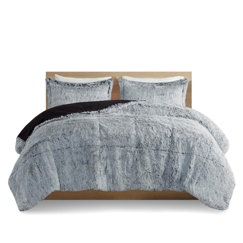 L'édredon simple / simple TG à poils longs gris, avec revers doux, comprend et 2 taies décoratives pour créer une chambre de rêve avec un style long et doux