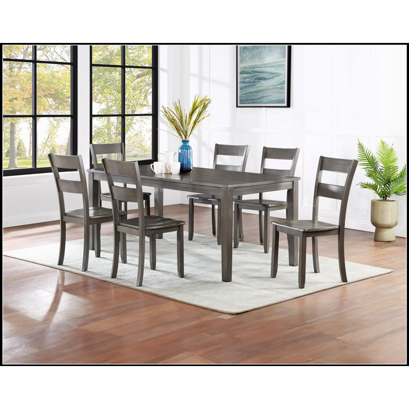 Ensemble de salle à manger 7 pièces transitionnel avec table rectangulaire, base en bois, chaises à dossier échelle et finition grise