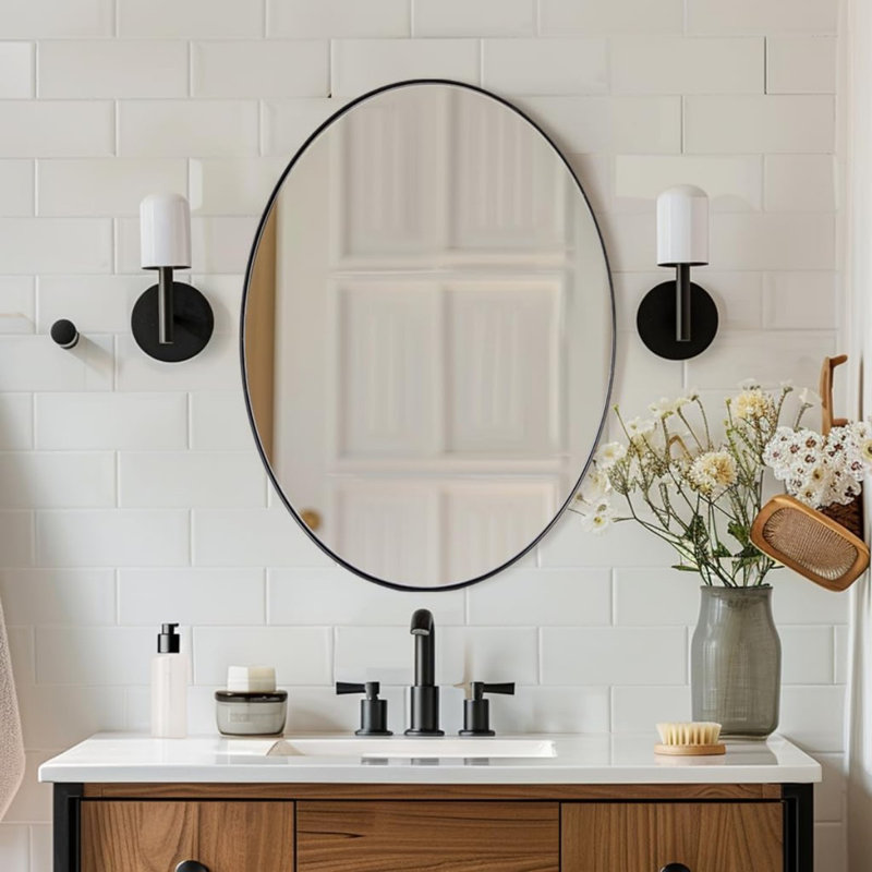 Miroir de salle de bain Kaitlee Cadre en acier inoxydable, Noir mat, 28 po x 20 po, Ovale et ronde
