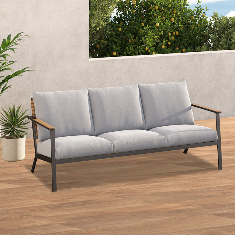 Tansi 3 Person Steel Sofa With Faux Leather Wicker
