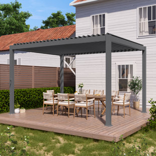 Pergola en aluminium avec auvent à persiennes