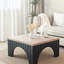 Table basse moderne en bois naturel - Base noire pour les espaces de vie