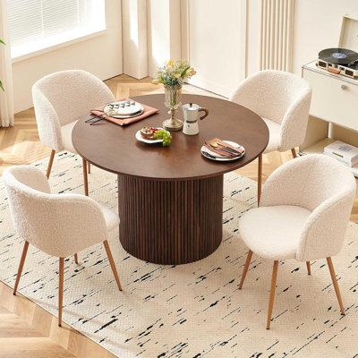 Round Table With Set Of Four Barrel Chairs