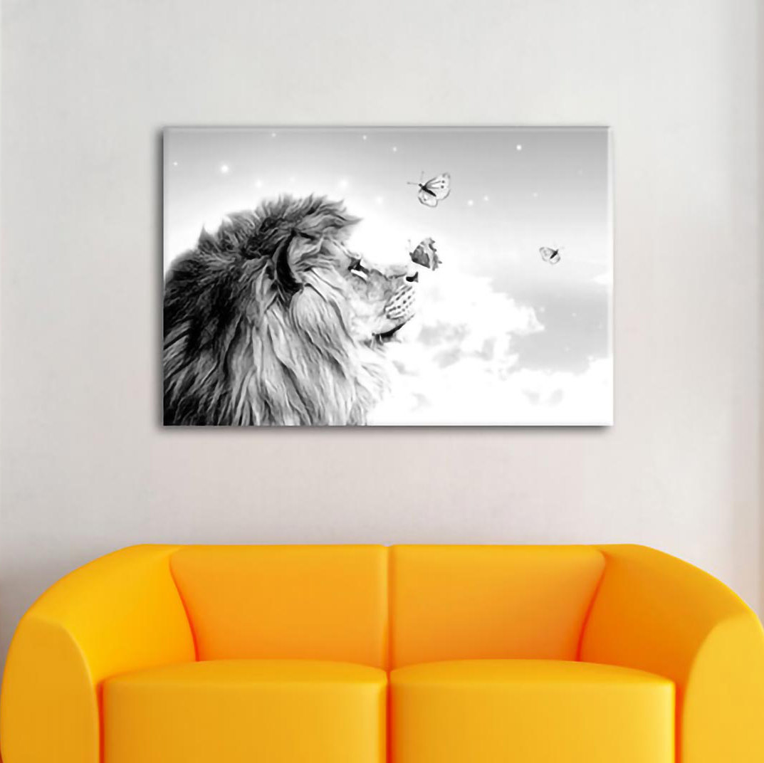 Leinwandbild Lion with Blue Butterflies