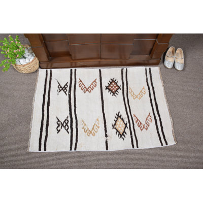 Tapis de porte en laine tissé à la main avec un motif kilim turc avec des motifs géométriques et un style bohémien