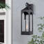 Marla Dusk to Dawn Iron Wall Light with Seed Glass Shade