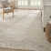 Ilijan Abstract Area Rug in Beige