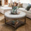 Grande table basse ronde à 2 niveaux avec repose-pieds capitonné-130087994