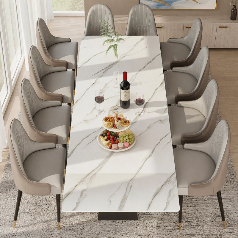 8-Piece Dining Set Featuring A 78.7"-110.2" Extendable Sintered Stone Dining Table And 8 Faux Leather Dining Chairs, White
