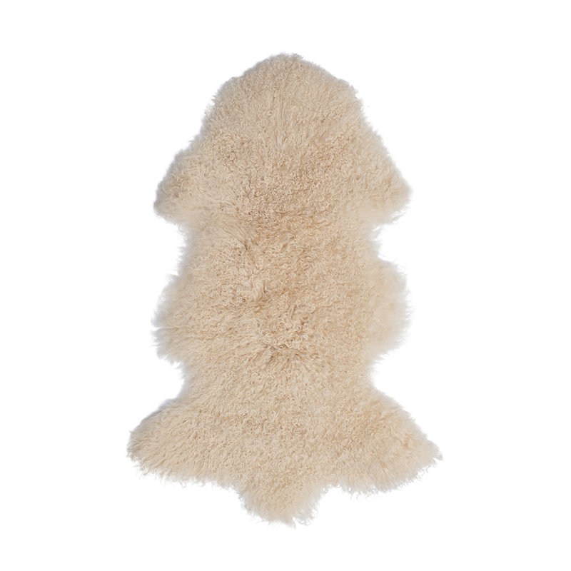 Mccarley Sheepskin Area Rug in Off White