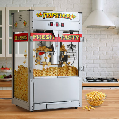 Machine à maïs soufflé Top Star - bouilloire en acier inoxydable 12 oz, plateau à grains Reject, lumière chauffante et accessoires par Great Northern Popcorn (rouge et jaune)