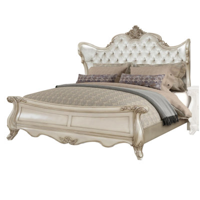 Iysla Upholstered Wingback Bed