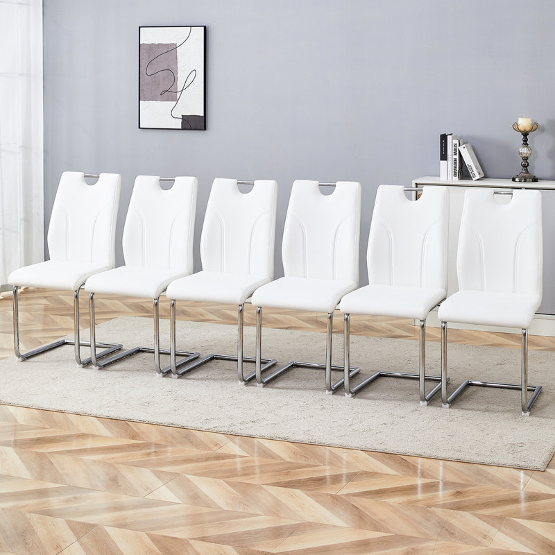 Chaise de salle à manger blanche 6 pièces - Option élégante et confortable. Matériau, doux. Pieds en métal argenté, look moderne. Siège rembourré en éponge. Conception ergonomique. Forte capacité de charge. Glissez. P 15,94 po x 15,71 po