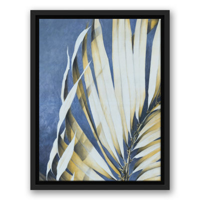 Feuilles de palmier sur fond bleu