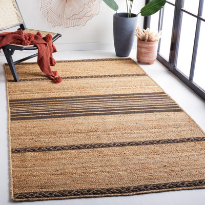 Tapis en jute / coton rayé brun en fibres naturelles Dequawn