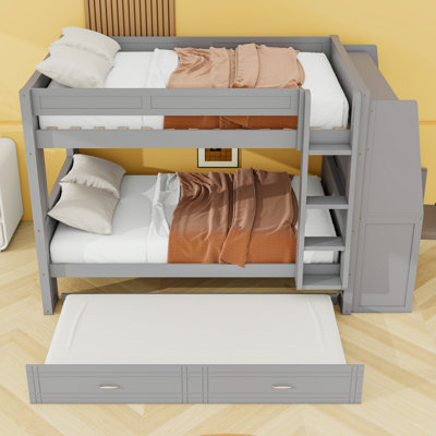 Lit superposé double au-dessus de double avec bureau, bibliothèques et lit gigogne simple