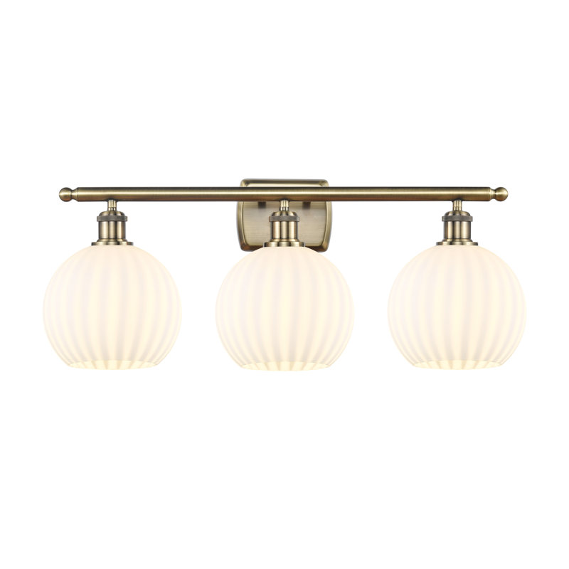 Éclairage de salle de bain à intensité variable à 3 lumières Berklie, Laiton antique