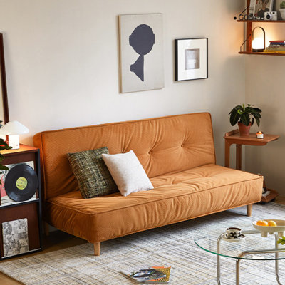 Coussin orange modulaire en velours côtelé