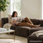 Canapé modulaire en chenille avec assise profonde et repose-pieds-74816695