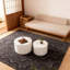Table basse ronde blanche avec rangement caché