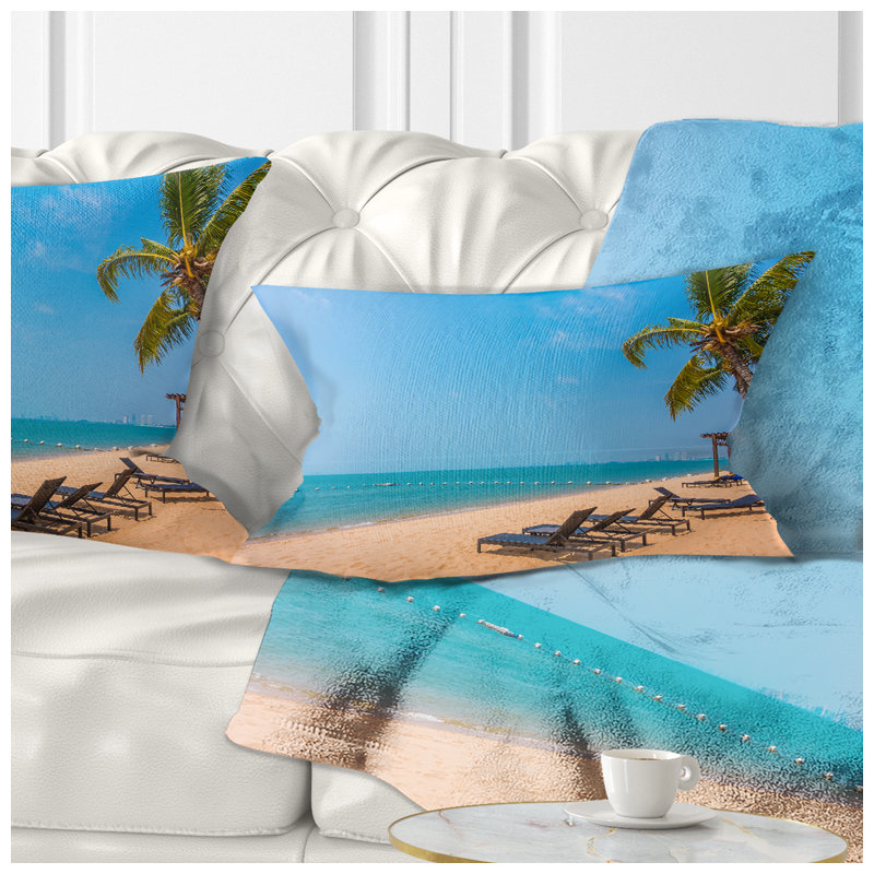 Coussin imprimé plage bleue avec palmiers
