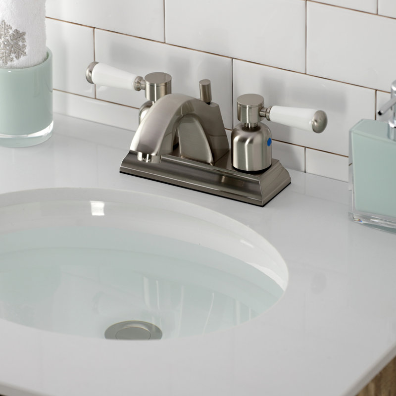 Kingston Brass Paris Two-Handle 3-Hole Deck Mount 4" Centerset Bathroom Faucet with Pop-Up Drain, Brushed Nickel