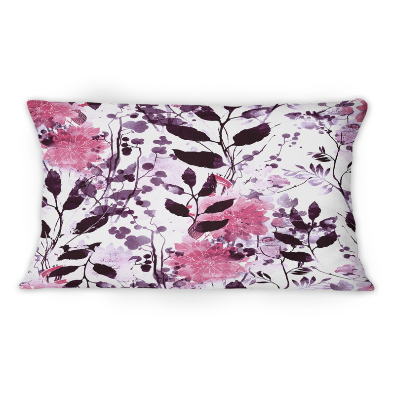 Coussin décoratif imprimé à motif de feuilles roses et noires sur fond blanc
