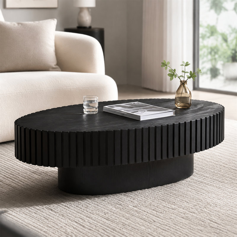 Table basse moderne ovale noire de 43,7 po avec base piédestal robuste pour le salon, Noir mat