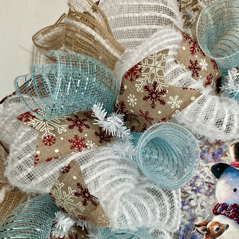 Couronne de Noël avec un chapeau de père Noël