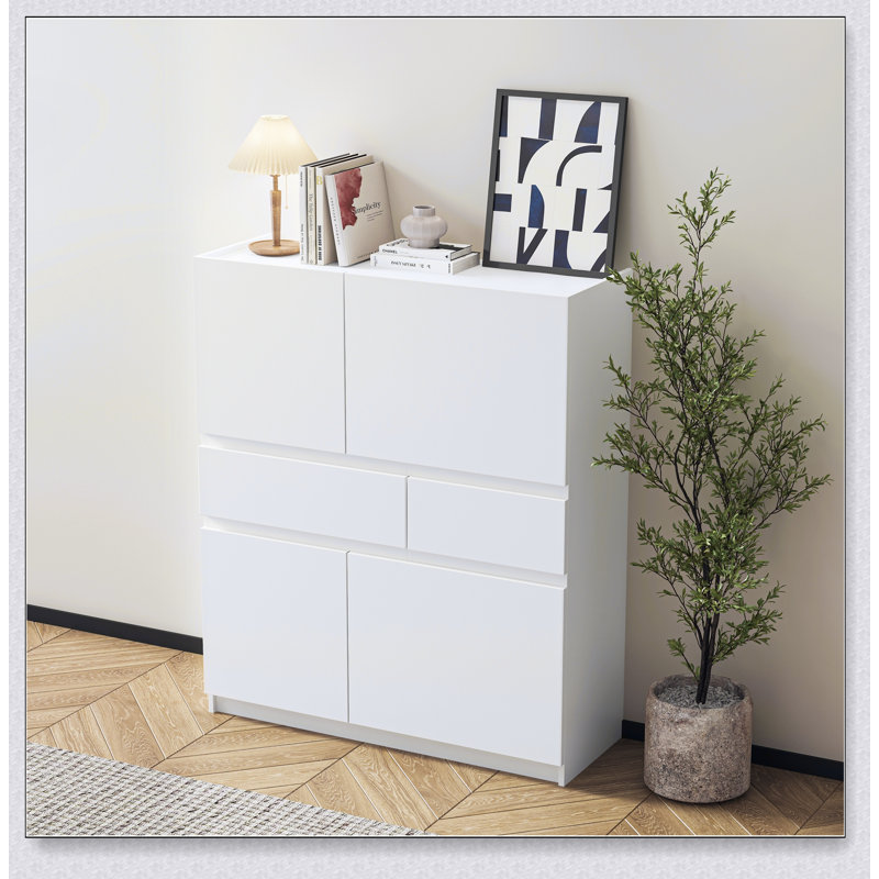 Armoire de rangement en bois blanc avec 4 portes, 2 tiroirs et une sécurité anti-arrachement pour une organisation moderne