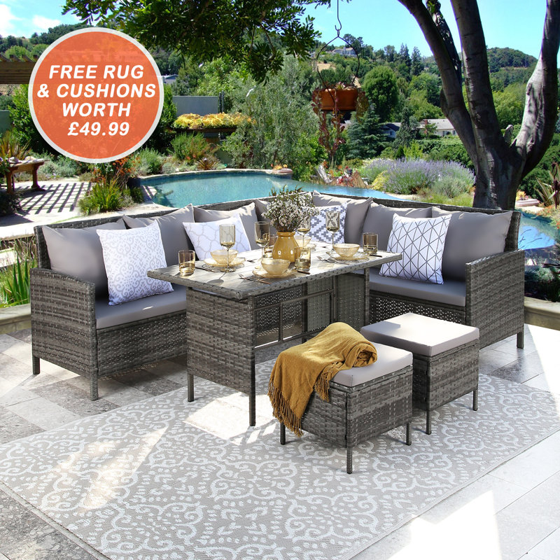 Adidev Rattan Wicker 9 - Person Seating Group with Cushions