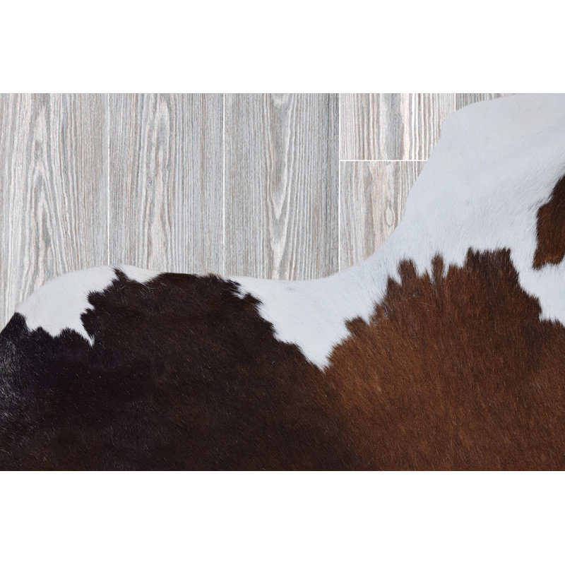 Tapis brun en cuir de vache véritable Doerun