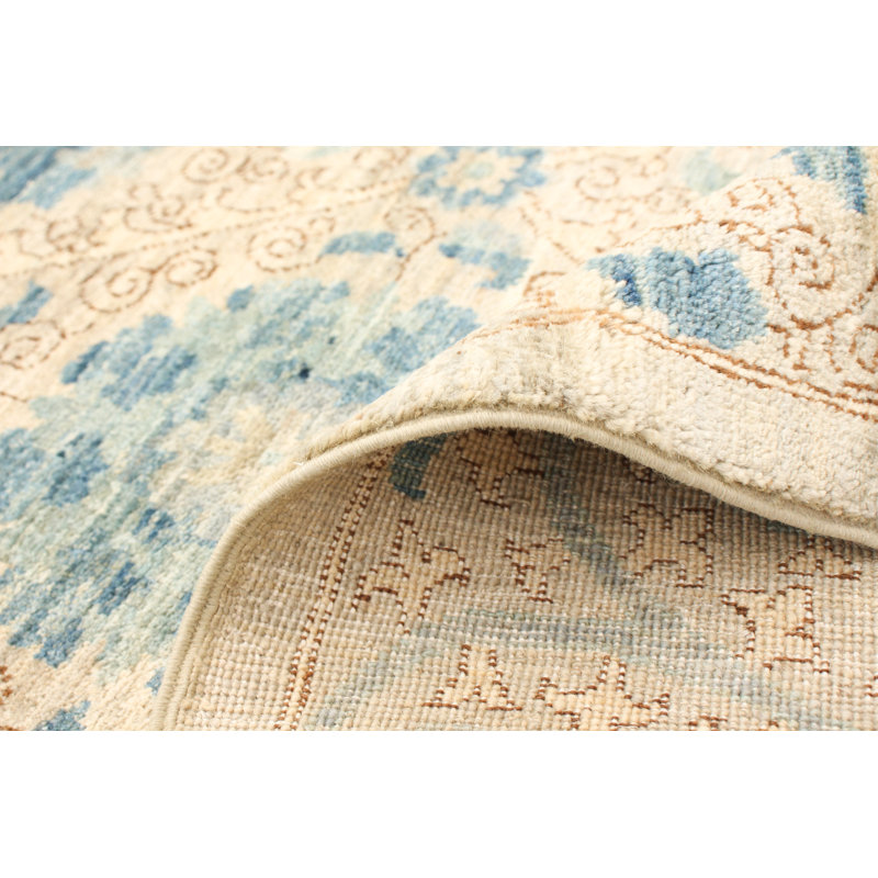 Tapis crème en laine noué à la main Deluna
