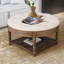 Grande table basse ronde à 2 niveaux avec repose-pieds capitonné-578341339