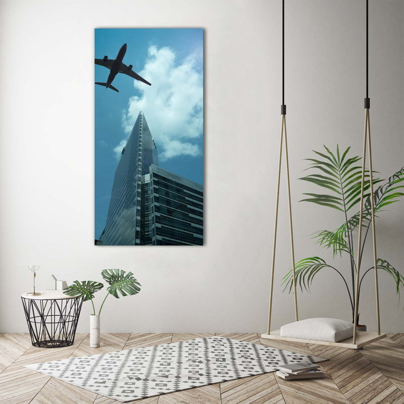 Plane Over The City - Wrapped Canvas Print